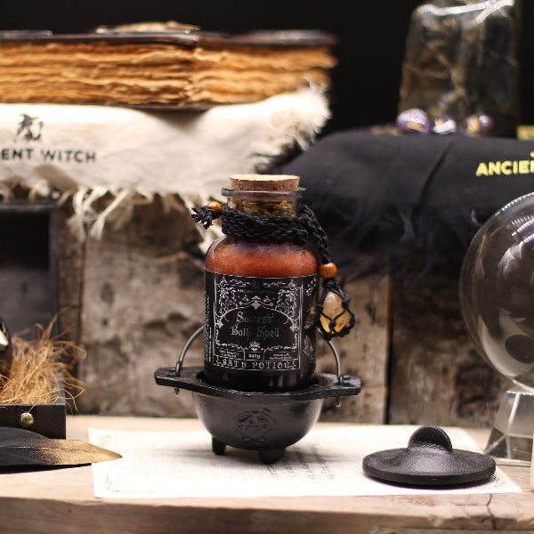 Decorative bottle with label on a stand in a mystical setting