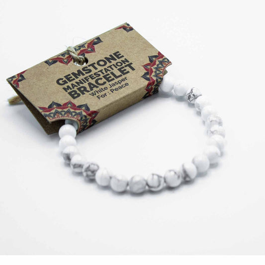 White gemstone bracelet with packaging on a white background