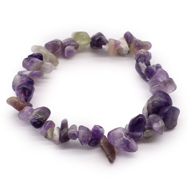 Purple and green gemstone bracelet on a white background