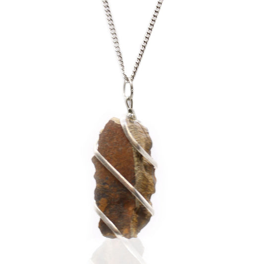 Necklace with a large, rough-textured stone pendant on a white background