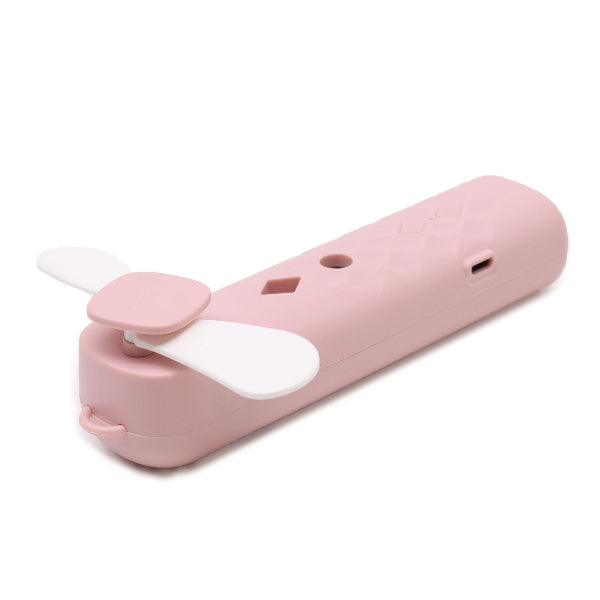 Pink and white device with fan-like components on a white background